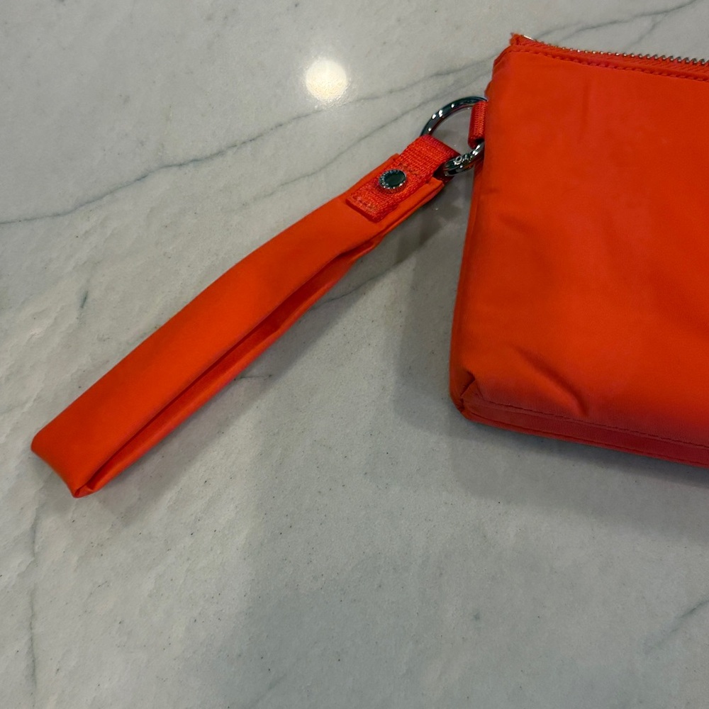 lululemon athletica Vibrant Orange puffy Wristlet - Picture 2 of 11